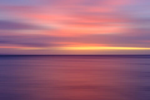 Purple Reign is an abstract beach sunset image created by using intentional camera movement and a long exposure. Fine art by Andrew Shoemaker