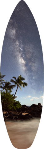 a night time photograph featuring the milky way galaxy rising over palm trees at secret beach on the hawaiian island of Maui.  Photo by Andrew Shoemaker