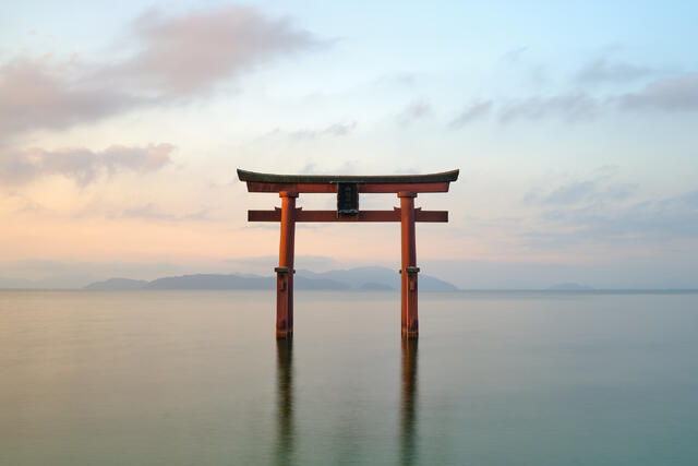 Timeless reflection is a special image of a floating Torii gate on Lake Biwa in Japan near Kyoto photographed by fine art photographer Andrew Shoemaker
