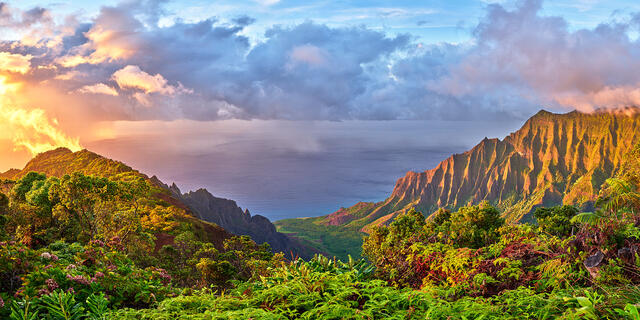 panoramic sunset captured at the beautiful Kalalau Valley along the Na Pali Coastline of the Hawaiian island of Hawaii