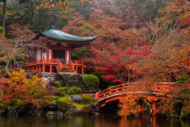 Fall colors at Daigo-ji temple in Kyoto, Japan reflecting on the water