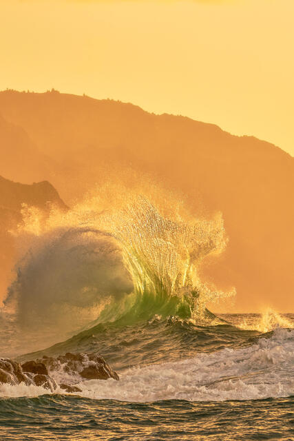 two waves collide along the na pali coast of Kauai from Ke'e beach near Hanalei on the island of Kauai.  Large photography wall art by Andrew Shoemaker