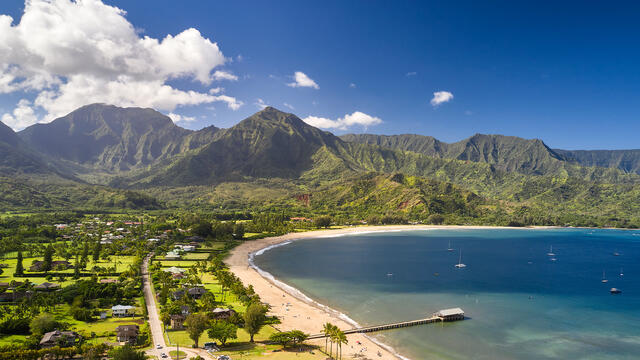 a beautiful panorama of Hanalei Bay on the Hawaiian island of Kauai as captured from a drone.  Fine art aerial photography by Hawaii artist Andrew Shoemaker