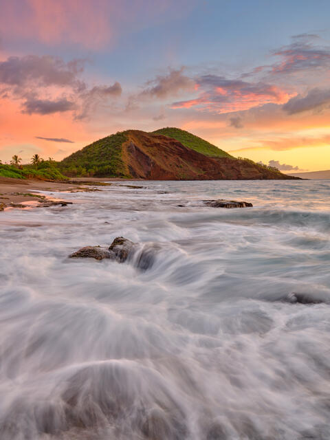 a beach sunset looking down Makena's Onelui beach with incoming water in the foreground.  Beach Sunset fine art photography by Andrew Shoemaker