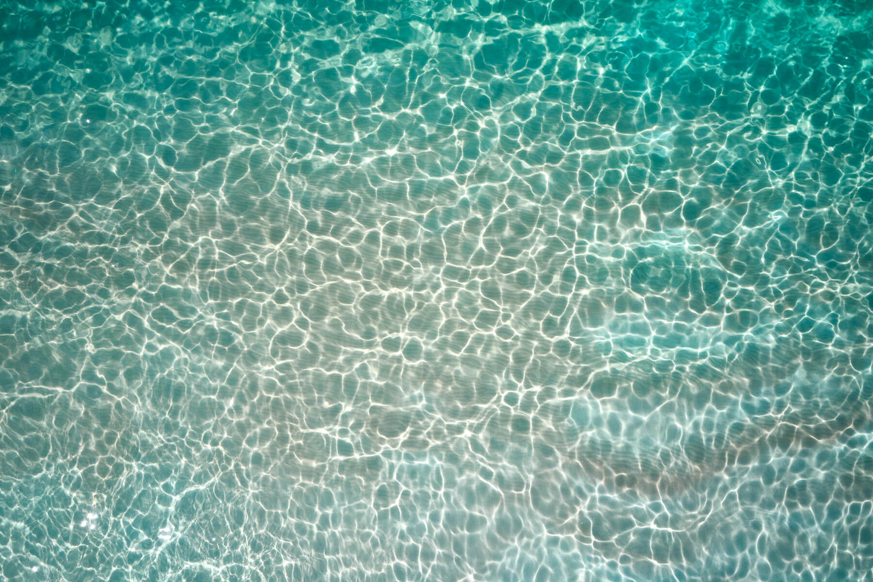 Aqua Therapy I is a relaxing ocean abstract image of the Maui water that is a stunning piece of wall art. photographed and created by artist Andrew Shoemaker
