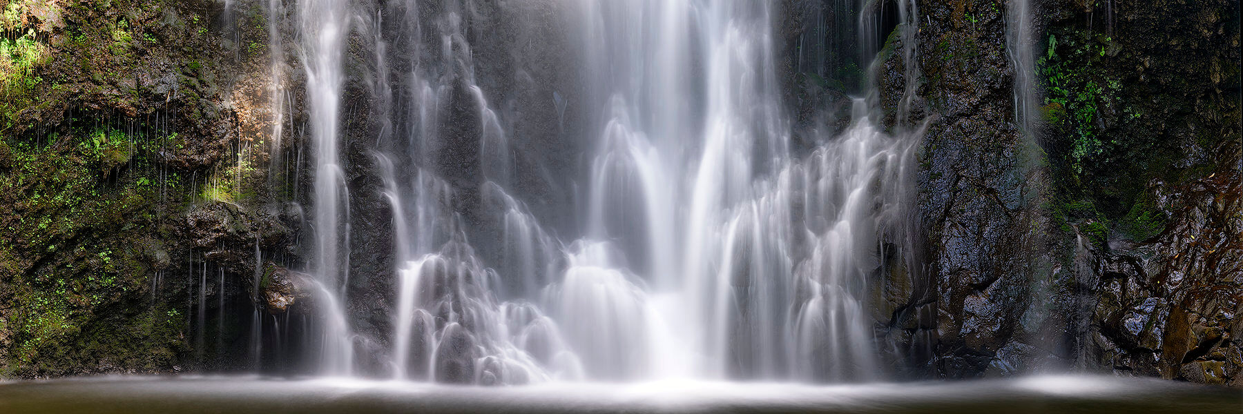 Cascade panorama of the beautiful wailua falls near Hana, Hawaii on the Hawaiian island of Maui. Hawaii panorama photography by artist Andrew Shoemaker