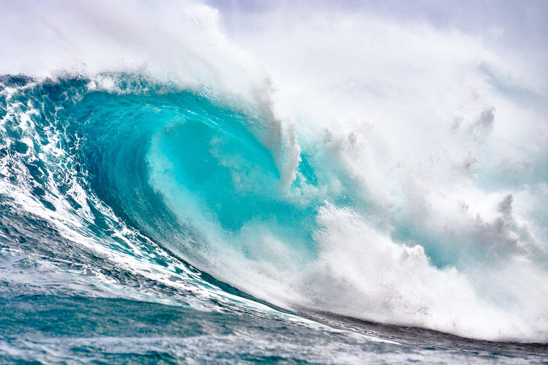 the biggest wave in Hawaii called Jaws crashes in a dramatic photograph by Andrew Shoemaker.  Hawaii Fine Art Wave Photography