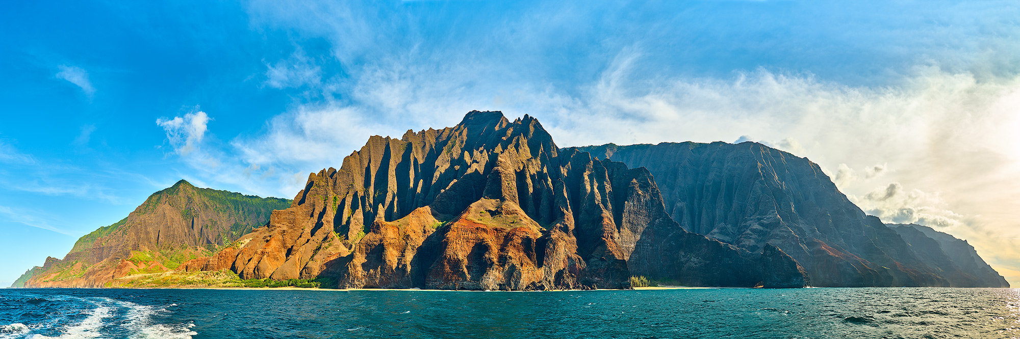 a beautiful panorama of the stunning Na Pali coast on the Hawaiian island of Kauai.  Hawaii fine art panoramic photography by Andrew Shoemaker