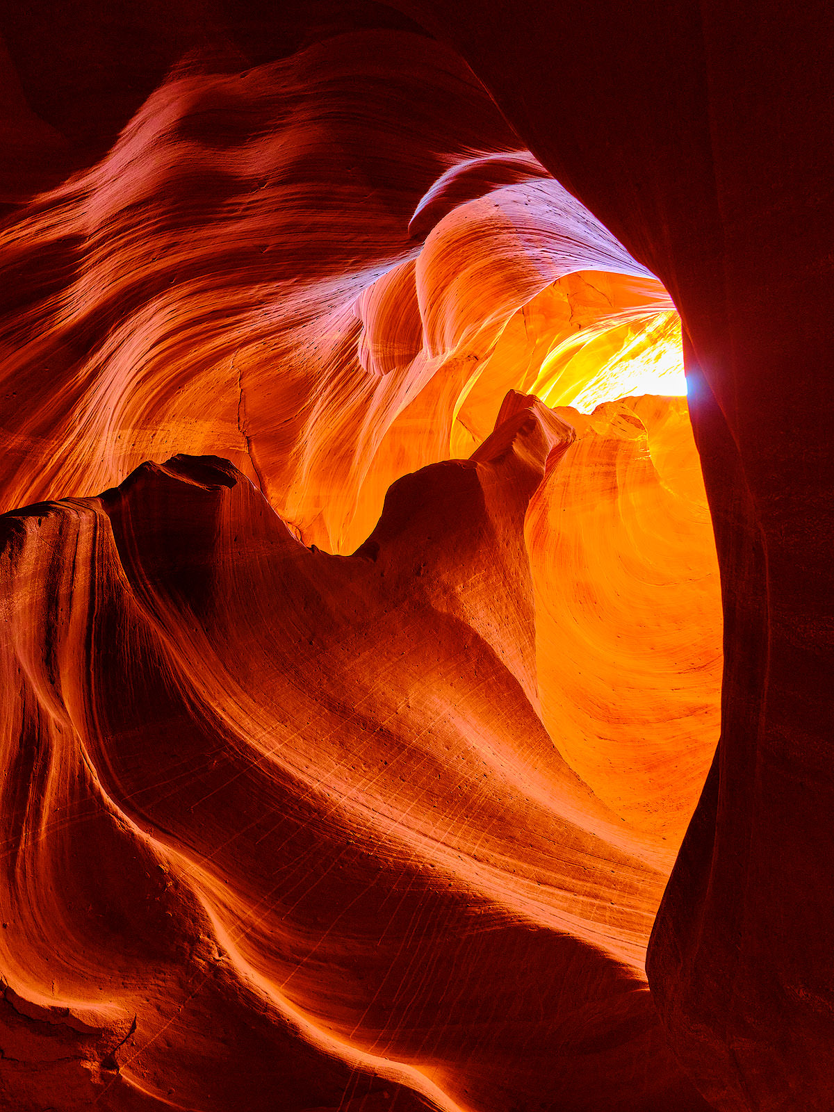 A beautiful fine art photograph representing the shape of a heart inside of Antelope Canyon in Page, Arizona.  American Southwest Fine Art by Andrew Shoemaker