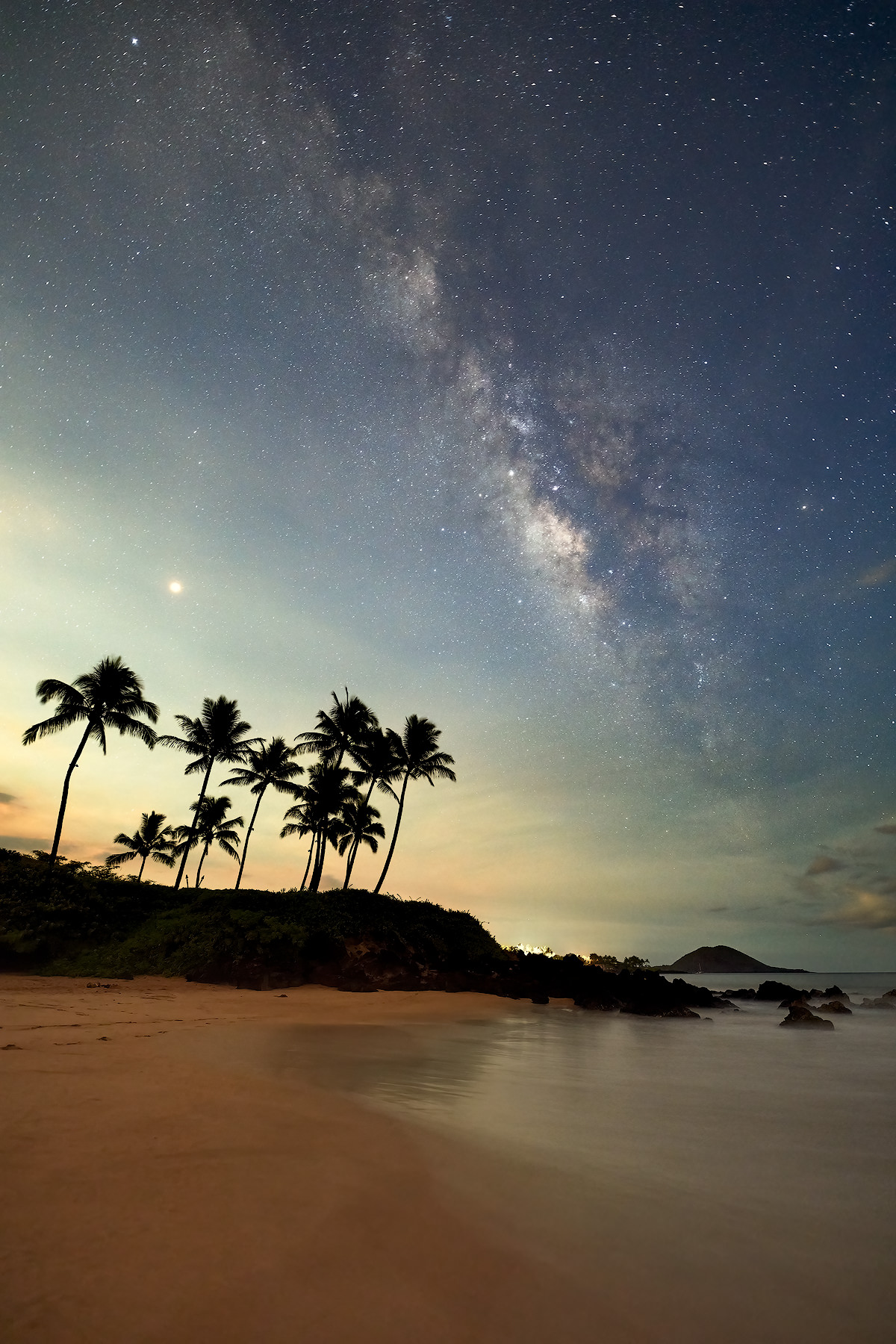 Infinite Paradise a night time image of the milky way galaxy over the beautiful beach in Makena on the island of Maui, Hawaii. Fine art nature photography by Andrew Shoemaker