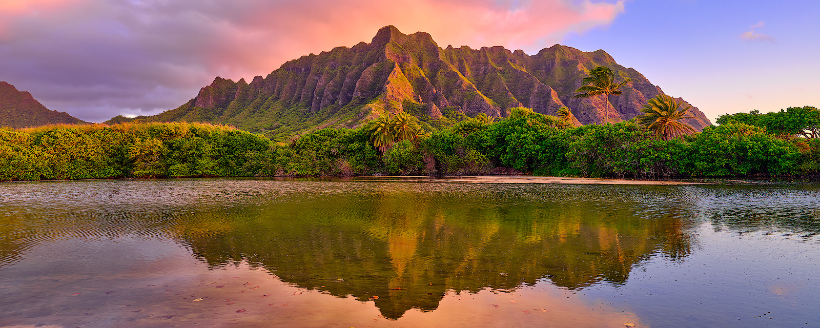 Jurassic Dawn sunrise panorama photograph of kualoa mountains on the hawaiian island of Oahu. Fine art panoramic photography by Hawaii artist Andrew Shoemaker