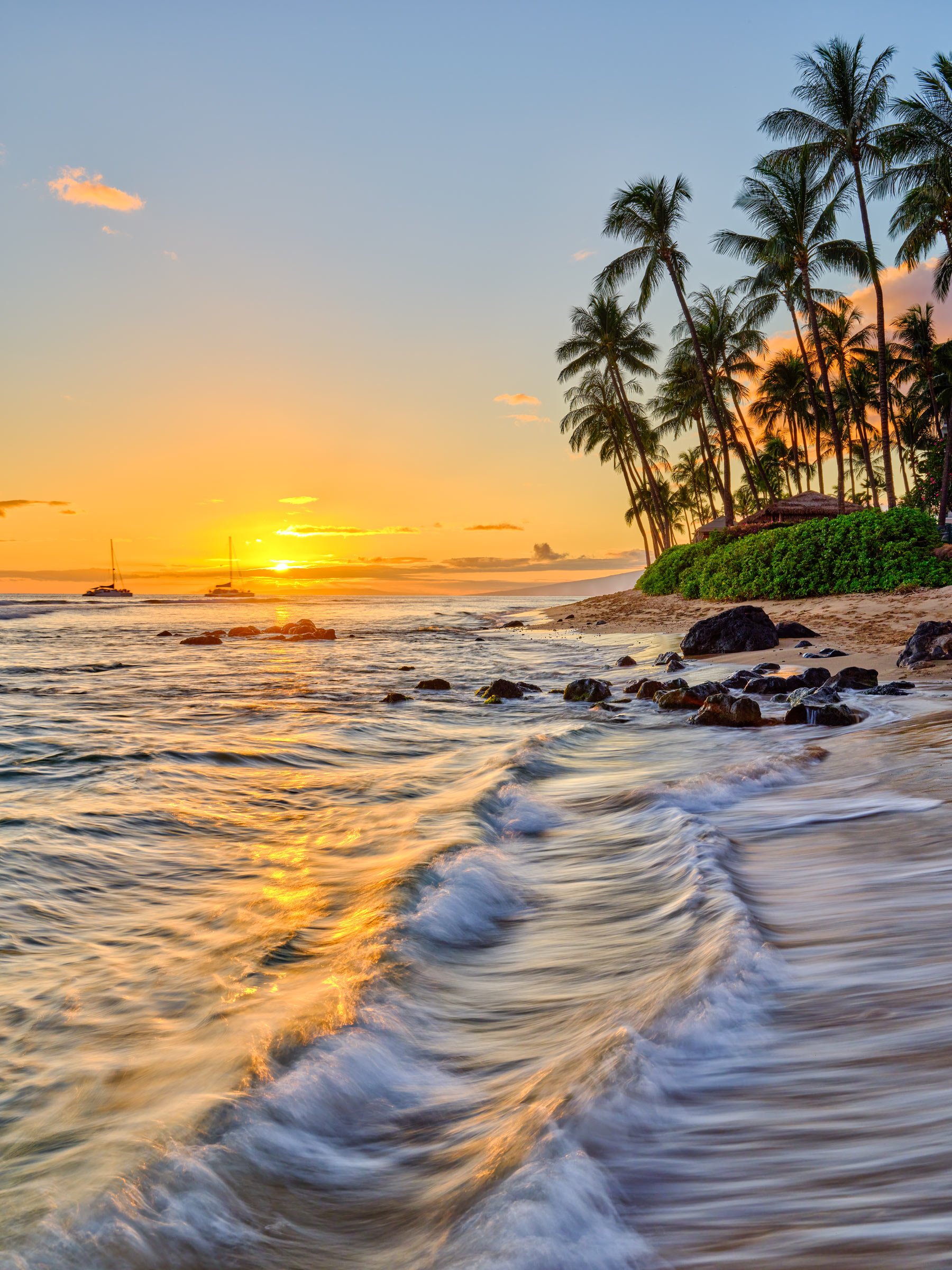 a beautiful sunset in front of the Marriot resort on Kaanapali Beach on the Hawaiian island of Maui.  Fine art limited edition photography by Andrew Shoemaker