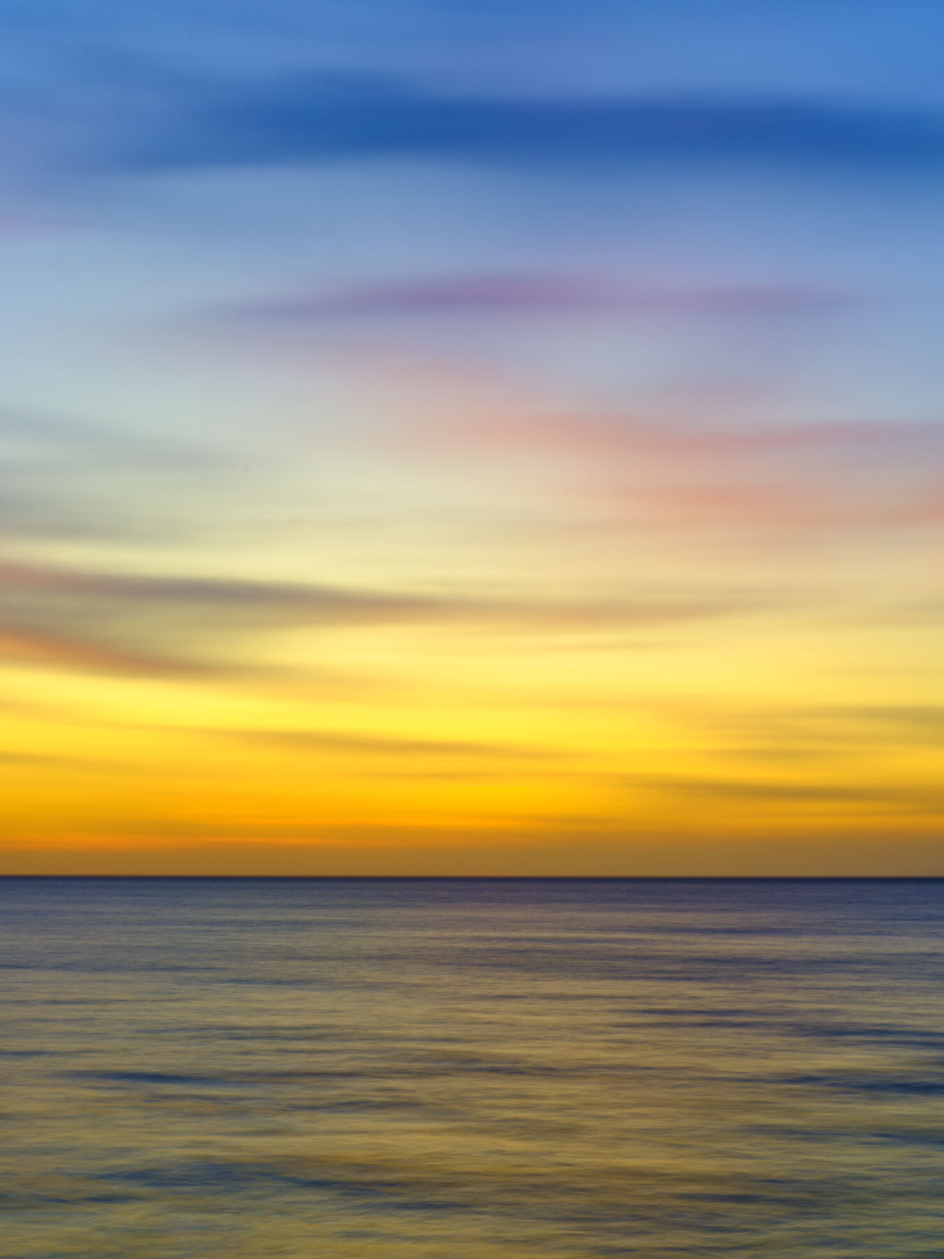 an abstract image captured by photographer Andrew Shoemaker of the color palette of Maui at sunset