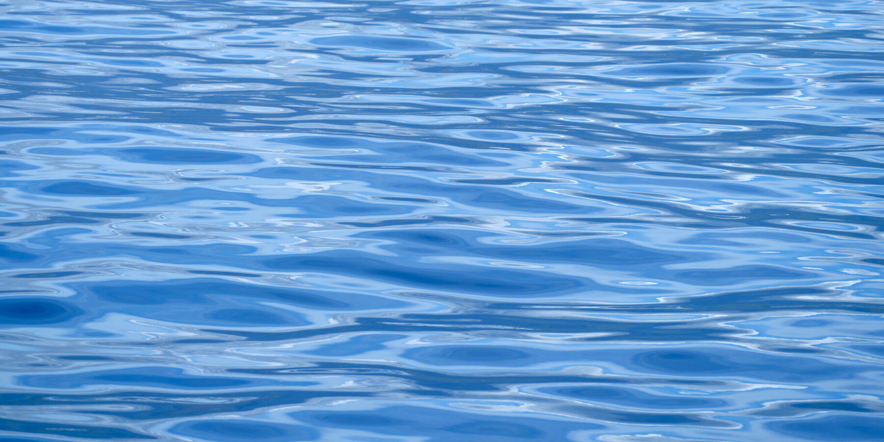 a blue ocean abstract image featuring the beauty of the pacific ocean off the coast of Maui.  Abstract Landscape Ocean Photography by Andrew Shoemaker