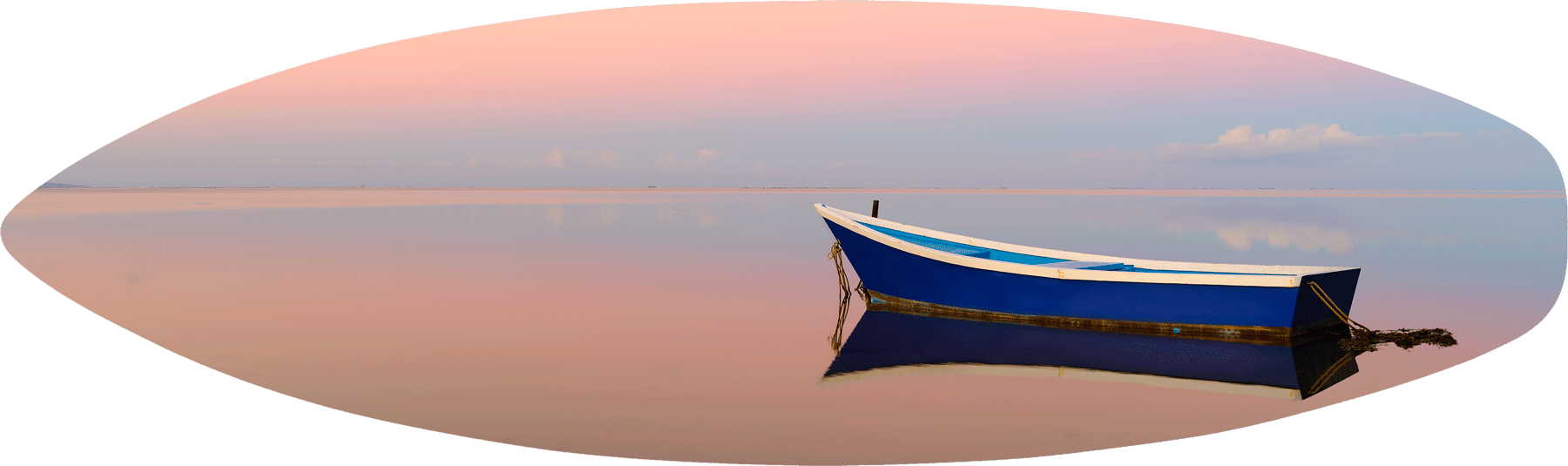 a lone boat reflecting in the mirror like pacific ocean at sunrise on the Hawaiian island of Molokai.  Panoramic photograph by Andrew Shoemaker