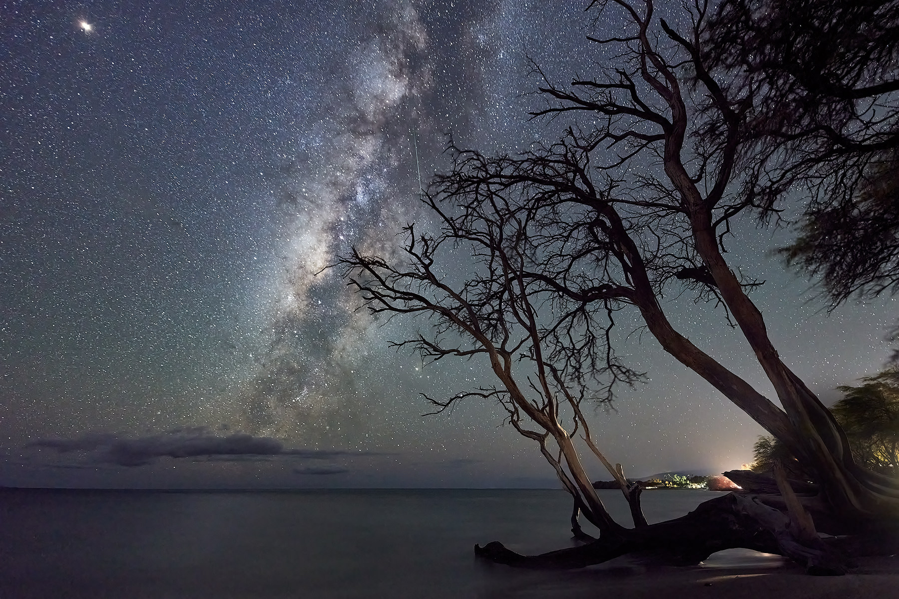 a night time photograph of the core milky way galaxy making it's way across the sky near Lahaina, Hawaii on Maui.  Hawaii Fine Art Photography