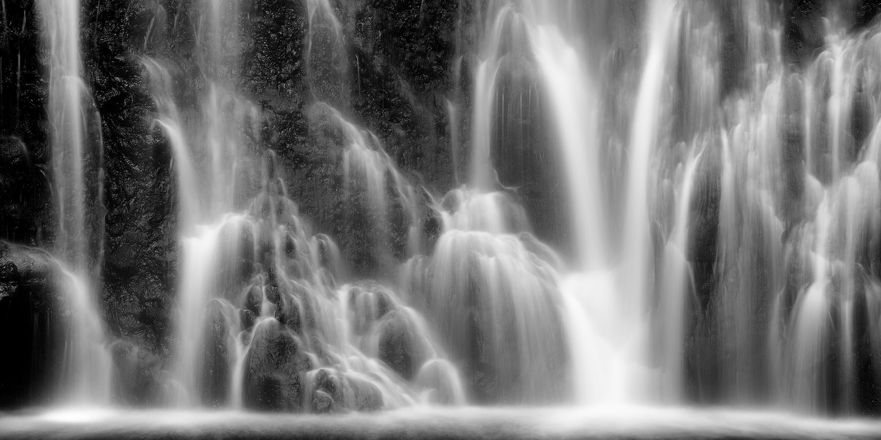 a long exposure panoramic photograph of the beautiful Wailua falls near Hana on the island of Maui, Hawaii.  Fine Art Hawaii Photography by Andrew Shoemaker