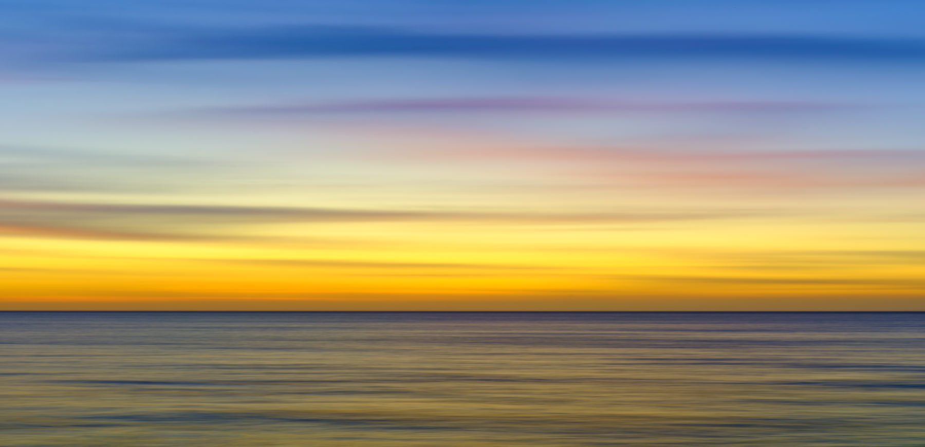 Zenfinity Zenfinity is a peaceful abstract ocean sunset image over the Pacific Ocean in Maui created by intentional camera movement. Photograph by Andrew Shoemaker